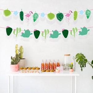 Tropical party decorations with pink flamingo, palm leaves and cactus paper bunting banners