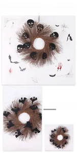 Detailansicht Halloween-Kranz mit schwarzen Totenkopf- und Fledermaus-Silhouetten auf Zweigen