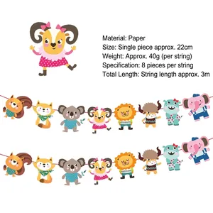 Close-up of animal paper banner featuring forest creatures for birthday party decoration