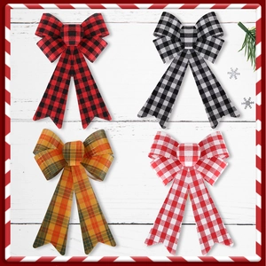 Detail view of four-piece set of classic buffalo plaid Christmas bows for holiday decor