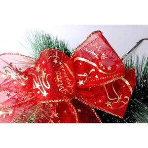 Red sheer Merry Christmas bow with gold lettering for festive holiday tree decoration