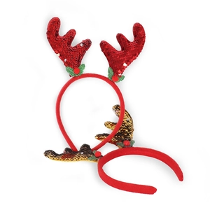 Detail of sequined Christmas reindeer antlers headbands with festive green leaf decor