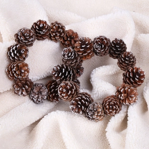 Natural pine cone heart wreath with snow effect for Christmas home decor and parties