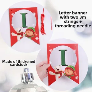 Close-up of thickened cardstock Christmas banner with festive polar bear and elf illustrations