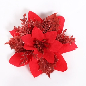 Close-up of 14cm red glitter poinsettia flower with velvet petals for Christmas decor