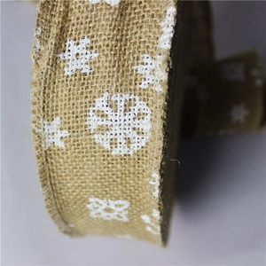 Natural jute Christmas ribbon with white snowflake patterns for tree decoration