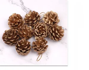 Group of 9 golden pine cones with metallic finish for festive Christmas tree decor