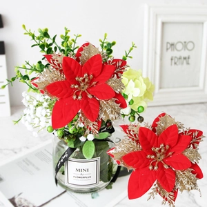 Close-up of a 14cm red Christmas glitter flower with a glass vase and ribbon