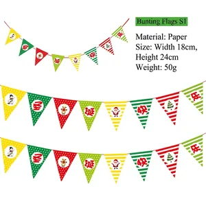 Detail of Christmas paper bunting flags with Santa and reindeer motifs in red and green