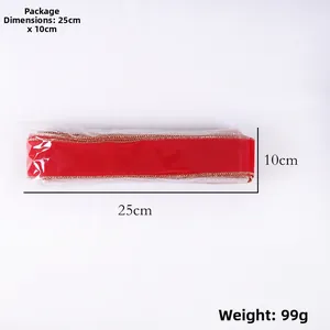 Detail showing red velvet ribbon with gold edges, package size 25cm and weight 99g