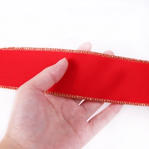 Red velvet Christmas ribbon with gold glitter wired edges for holiday tree decor