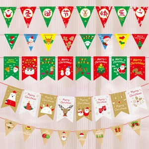 Christmas paper bunting banner set with Santa and reindeer motifs on wood background