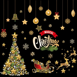 Detail van luxe gouden kerstboom- en rendierstickers met magische tekst