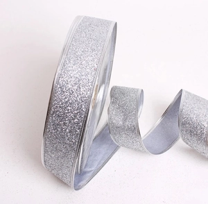 Close-up of sparkling silver glitter ribbon for Christmas tree decor and DIY crafts