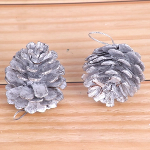 Silver painted natural pine cone Christmas tree ornaments with hanging loops detail