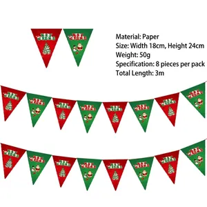 Detail of Merry Christmas paper bunting flags with Santa and tree motifs for party decor