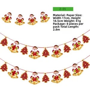 Vue détaillée d'une guirlande de Noël en papier de 8 pièces avec motifs Père Noël
