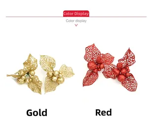 Detail of glittery gold and red hollowed Christmas leaves with sparkling berries