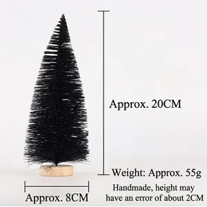 Close-up of a 20cm black mini Christmas tree with a natural wooden base and brush texture