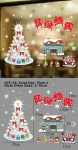 Detailed view of Christmas window stickers with white trees and reindeer patterns