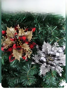 Detailed close-up of 14cm glitter plaid artificial Christmas flowers on a green tree