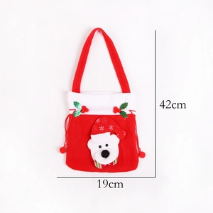 Detailed view of a polar bear Christmas gift bag with size labels 42cm and 19cm