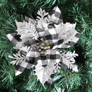 14cm Christmas Poinsettia with silver glitter and plaid petals on green pine background