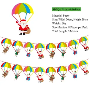 Detail of Christmas hot air balloon paper banners with Santa and reindeer designs