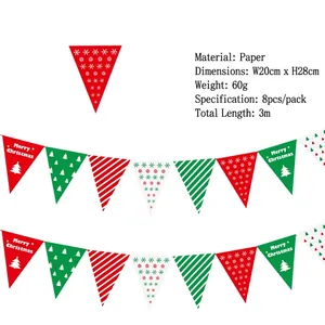 Detail of Christmas paper bunting flags featuring red, green, and white festive patterns