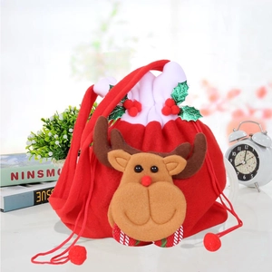 Detail of red Christmas drawstring gift bag with a 3D plush reindeer character