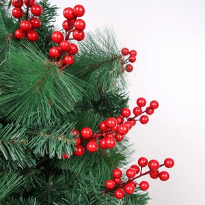 Artificial Christmas pine branches with realistic 14-head red foam berries for holiday decor