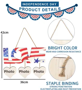 Detail of wooden 4th of July Love sign with American flag pattern and photo heart clips
