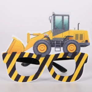 Close-up of yellow bulldozer party glasses for kids with black and yellow warning stripes