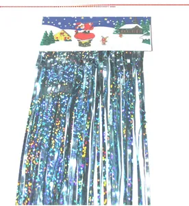 Detailed close-up of black holographic fringe curtain with Christmas themed card packaging