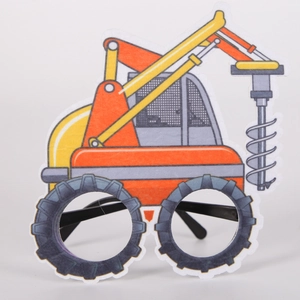 Detail view of orange excavator-shaped party glasses with black gear wheels