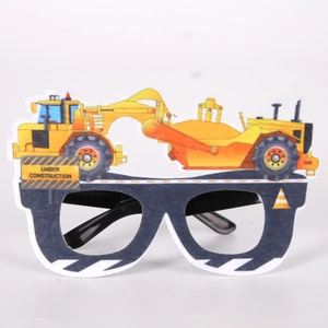 Detail view of yellow excavator glasses with under construction sign for kids' birthday parties