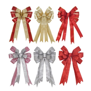 Set of six glittery Christmas bows in vibrant metallic colors for tree decoration