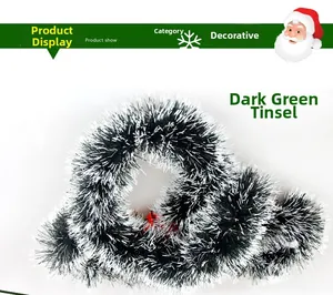 Detail of 9cm wide fluffy dark green and white tinsel garland for Christmas party decoration
