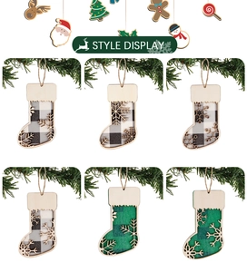 Detailed view of six wooden Christmas stocking ornaments with plaid fabric and snow patterns