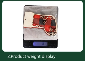 Detailed view of red and black plaid wooden stocking ornament showing weight on a digital scale
