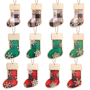 12-piece set of wooden Christmas stocking ornaments with buffalo plaid and snowflake cutout