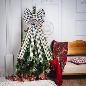 Large black and white buffalo plaid Christmas tree topper bow with rustic burlap trim decor