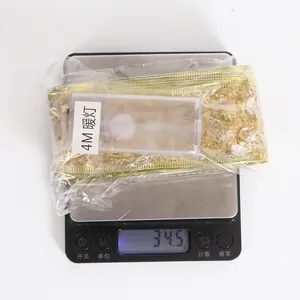 Weight measurement of 4m warm LED gold double-layer ribbon light for Christmas tree decor