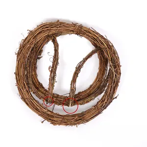 Close-up of handmade natural rattan rabbit-shaped wreath showing rustic woven wood texture