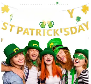 Glittering golden St. Patrick's Day banner with green shamrock and festive accessories