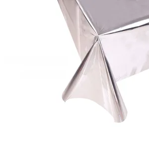 Close-up of waterproof rose gold PET tablecloth showing smooth metallic texture and drape