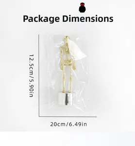 Detail view of golden Halloween skeleton decoration with dimensions in retail packaging