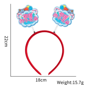 Detail view of red spring headband for kids with dimension markings and weight info