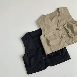 Close-up of kids cargo vests with multiple pockets in black and khaki colors