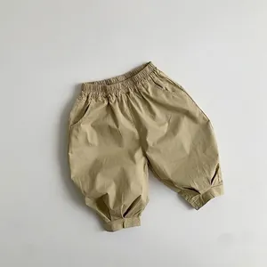 Détails du pantalon bouffant en coton kaki pour enfant avec taille élastique